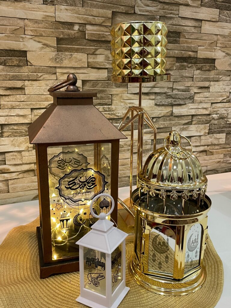 Ramadan house decor includes gold and white lanterns