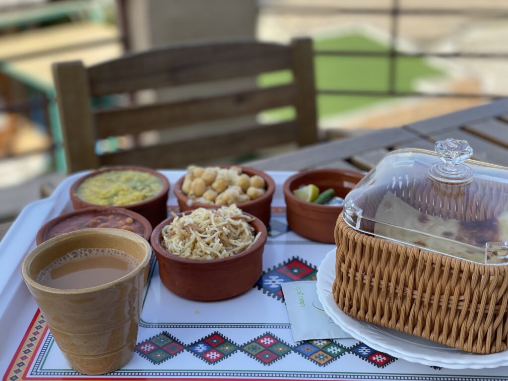 Breafast includes beans, chickpeas, dal, and sweet noodles